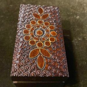 2 1/2 by 4 1/2 by 2 tall Made in Poland carved trinket box